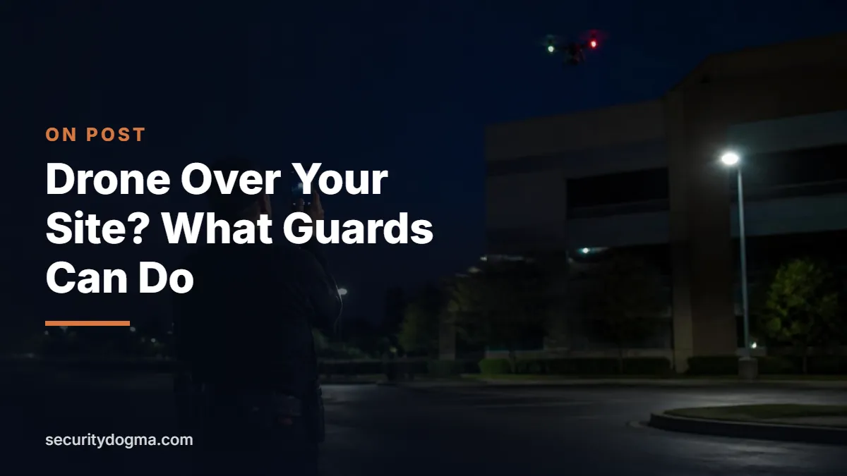 Security guard filming a drone hovering over an office building at night